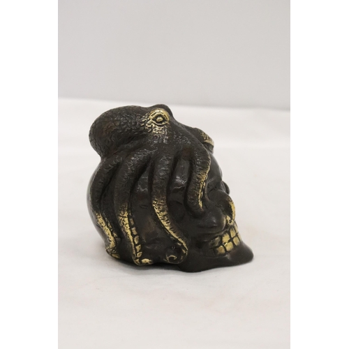 302 - A BRONZE OCTUPUS AND SKULL