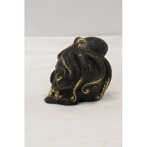 302 - A BRONZE OCTUPUS AND SKULL