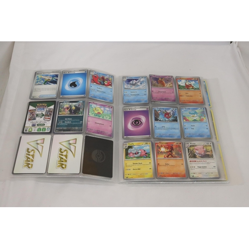 319 - A PROTECTIVE TRADING CARD BINDER FULL OF POKEMON CARDS, INCLUDING SHINIES