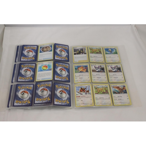 319 - A PROTECTIVE TRADING CARD BINDER FULL OF POKEMON CARDS, INCLUDING SHINIES