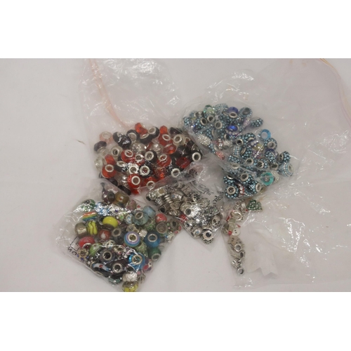 322 - A LARGE QUANTITY OF PANDORA STYLE BEADS, SOME MARKED 925