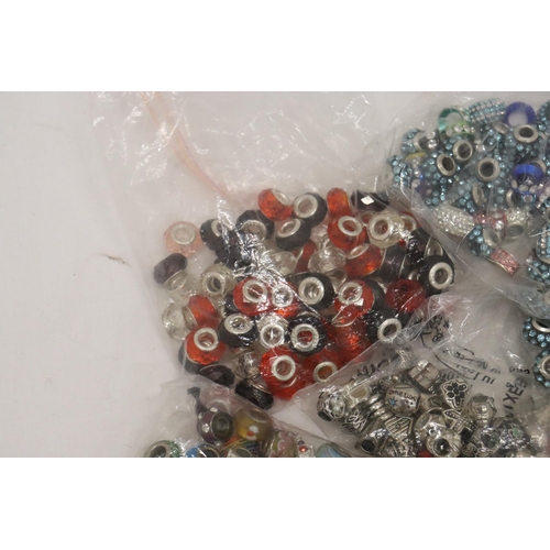 322 - A LARGE QUANTITY OF PANDORA STYLE BEADS, SOME MARKED 925