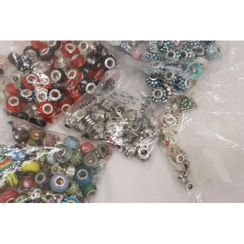 322 - A LARGE QUANTITY OF PANDORA STYLE BEADS, SOME MARKED 925