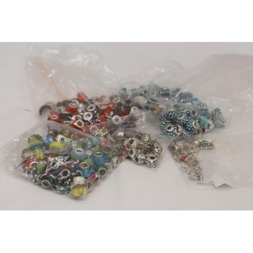 322 - A LARGE QUANTITY OF PANDORA STYLE BEADS, SOME MARKED 925