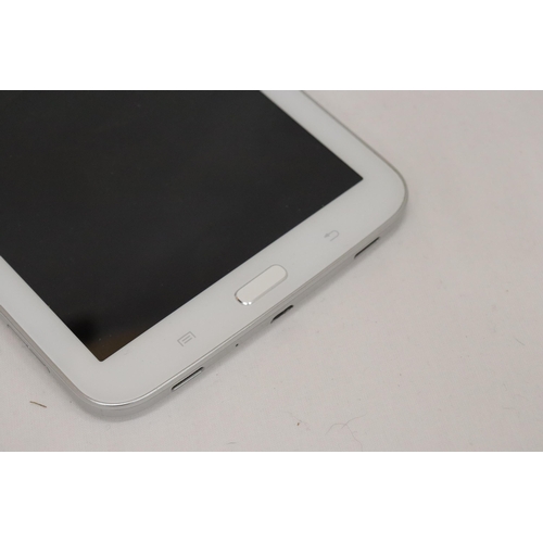 324 - A SAMSUNG TABLET WITH CHARGER, VENDOR STATES IN WORKING ORDER, NO WARRANTY GIVEN, 11CM X 19CM