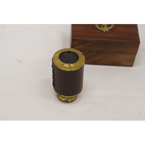 340 - A BOXED BRASS AND LEATHER TELESCOPE