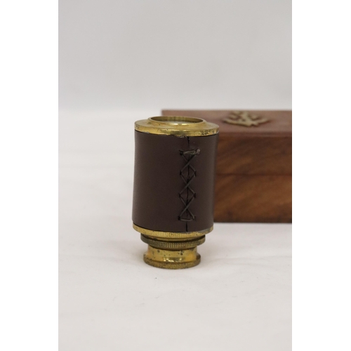 340 - A BOXED BRASS AND LEATHER TELESCOPE