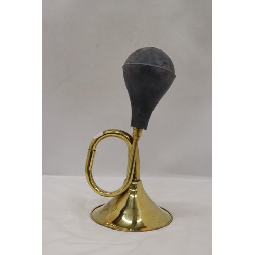 344 - A BRASS HORN