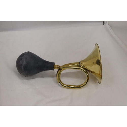 344 - A BRASS HORN