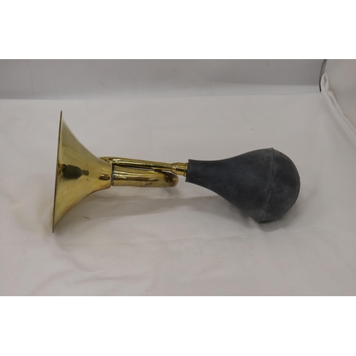 344 - A BRASS HORN