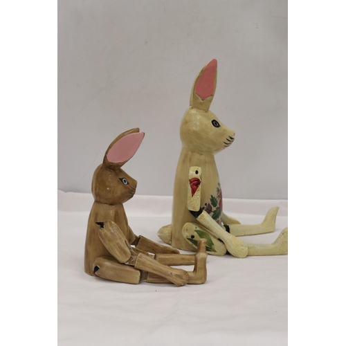 356 - TWO WOODEN SHELF RABBITS