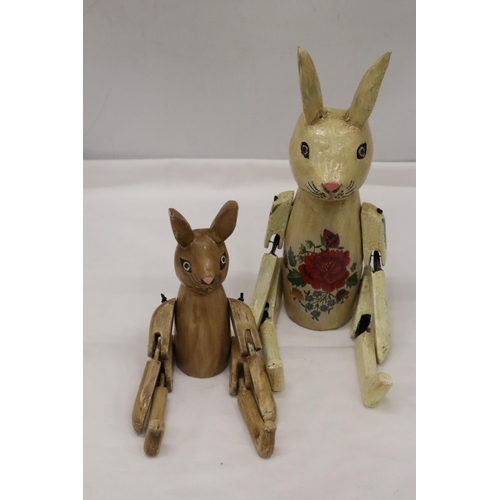 356 - TWO WOODEN SHELF RABBITS