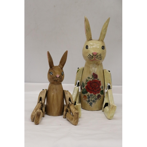 356 - TWO WOODEN SHELF RABBITS