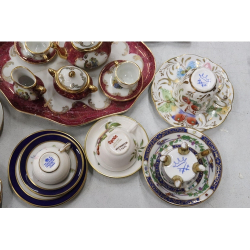 358 - A LARGE COLLECTION OF MINIATURE CHINA AND POTTERY TO INCLUDE LIMOGES AND HAMMERSLEY TEASETS ON TRAYS... 