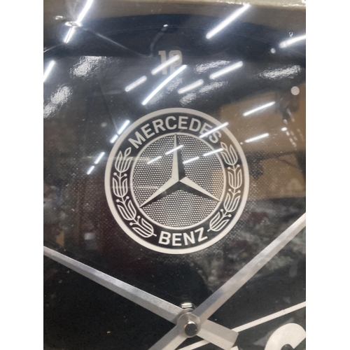 74 - AN AS NEW AND BOXED MERCEDES BENZ GARAGE WALL CLOCK