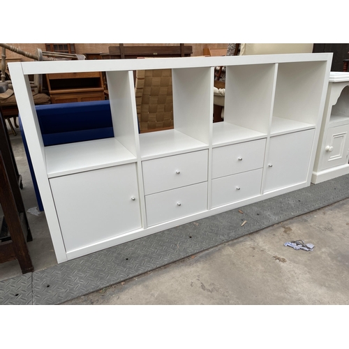 A WHITE BEDROOM STORAGE UNIT AND A BEDSIDE LOCKER