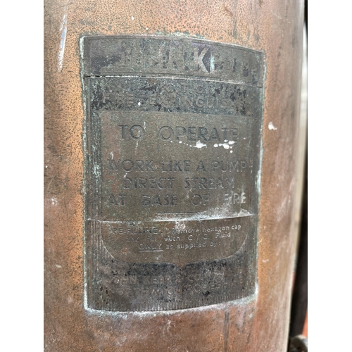 1544 - A VINTAGE COPPER FIRE EXTINGUISHER WITH IONDESTINCT PLAQUE