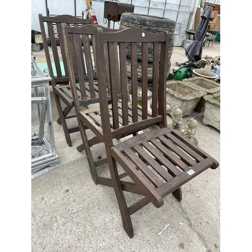 1858 - THREE WOODEN FOLDING GARDEN CHAIRS