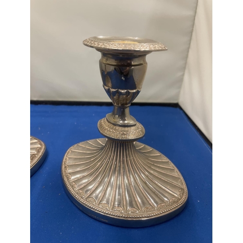 59 - A PAIR OF HEAVY ART DECO STYLE SILVER PLATED CANDLESTICKS