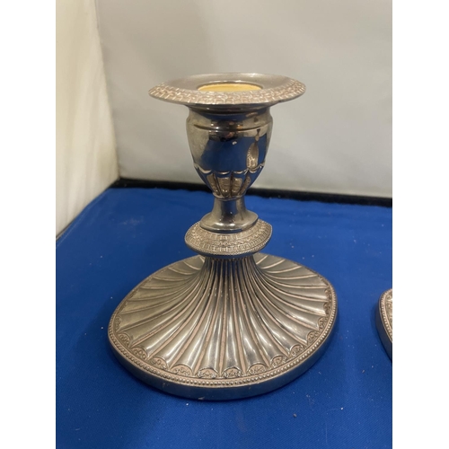 59 - A PAIR OF HEAVY ART DECO STYLE SILVER PLATED CANDLESTICKS