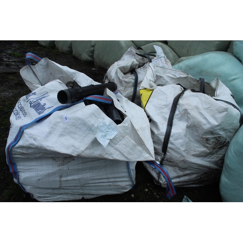 255 - THREE TOTE BAGS OF PLASTIC MAJORITY WRAP TUBES. + VAT