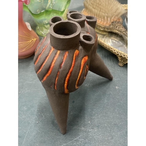 104 - A STUDIO POTTERY STONEWARE ABSTRACT FLOWER HOLDER