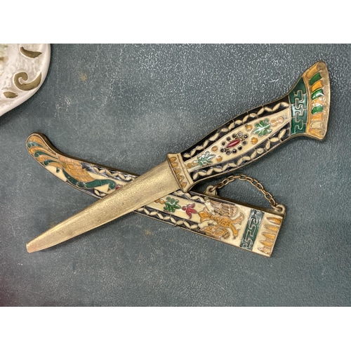 109 - AN ORNATE ENAMELLED DAGGER AND SCABBARD