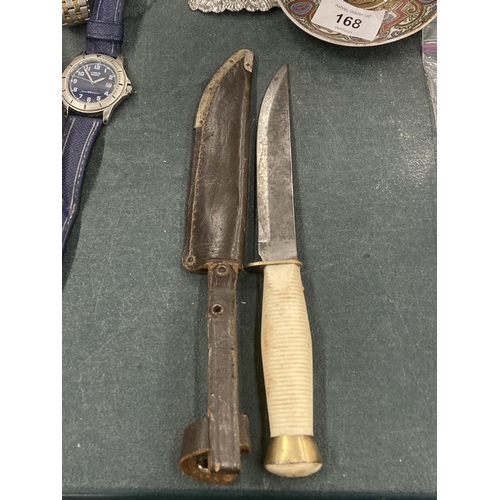 169 - A DAGGER IN A LEATHER SHEATH