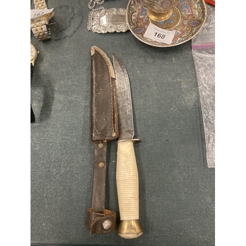 169 - A DAGGER IN A LEATHER SHEATH