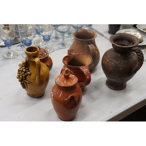 187 - SIX STONEWARE ITEMS TO INCLUDE JUGS, EWER AND LIDDED POTS