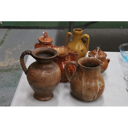 187 - SIX STONEWARE ITEMS TO INCLUDE JUGS, EWER AND LIDDED POTS