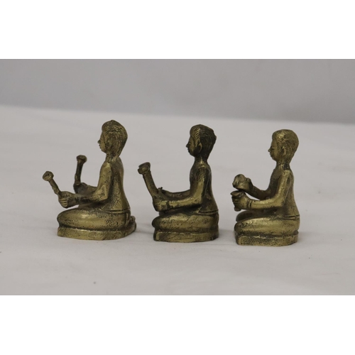 192 - THREE BRASS ASIAN FIGURES