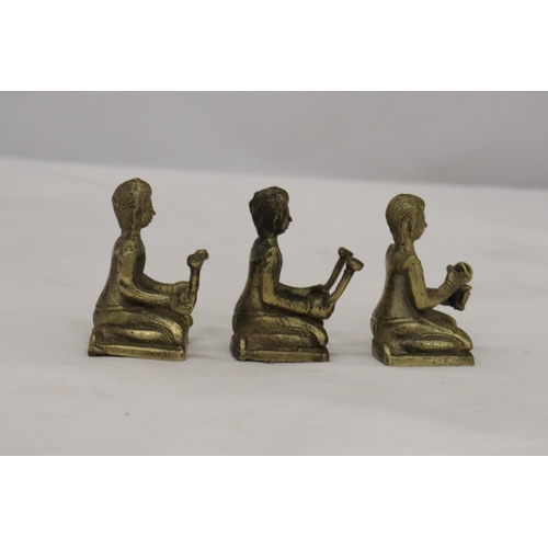 192 - THREE BRASS ASIAN FIGURES