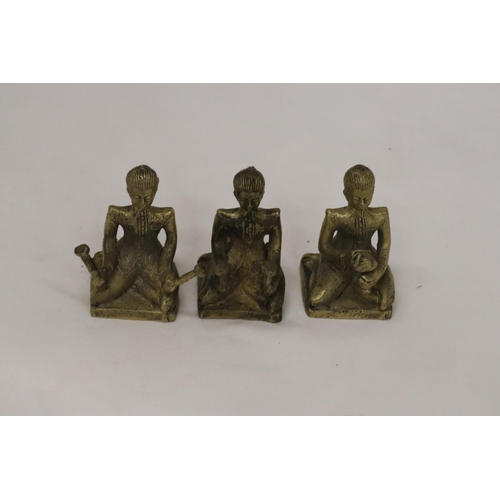 192 - THREE BRASS ASIAN FIGURES