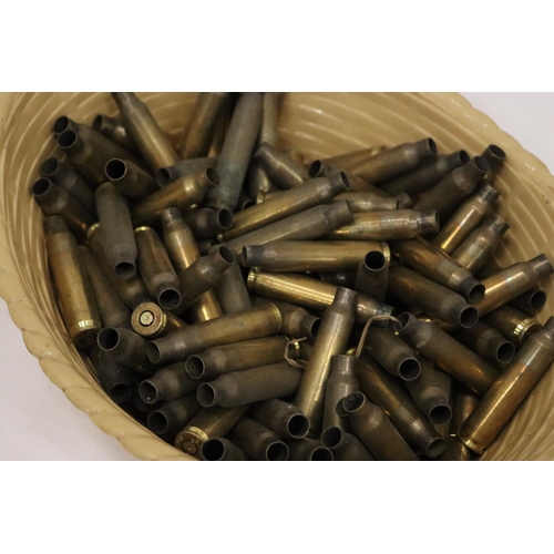 204 - A QUANTITY OF BRASS USED BULLET CASINGS