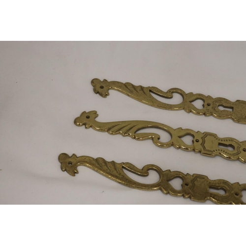 212A - THREE BRASS DOOR KEY PLATES