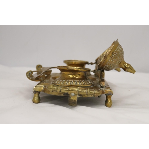 220 - AN ORNATE BRASS INKWELL AND LETTER OPENER