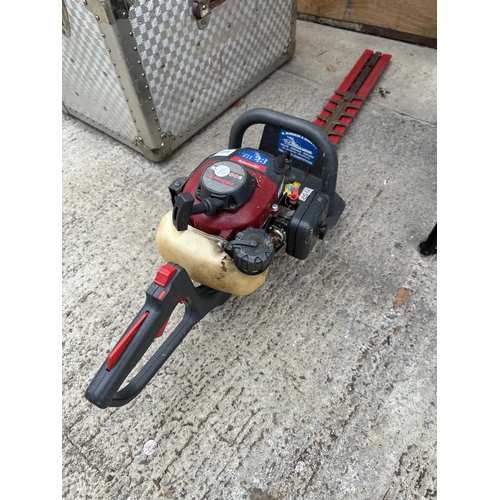 1695 - A KAWASAKI TH23 PETROL HEDGE TRIMMER