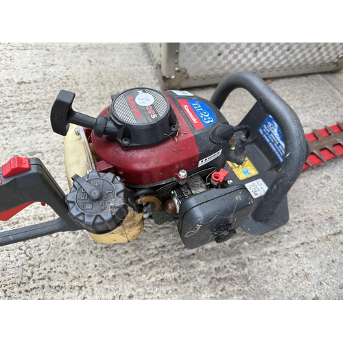 1695 - A KAWASAKI TH23 PETROL HEDGE TRIMMER