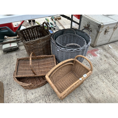 1700 - AN ASSORTMENT OF WICKER BASKETS TO INCLUDE TWO LOG BASKETS, A CAT BED AND TRUGS ETC