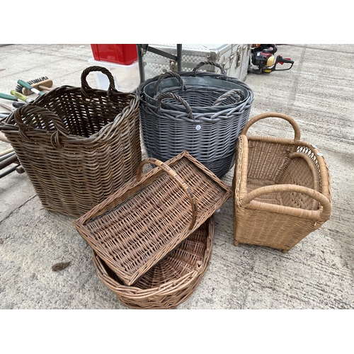 1700 - AN ASSORTMENT OF WICKER BASKETS TO INCLUDE TWO LOG BASKETS, A CAT BED AND TRUGS ETC