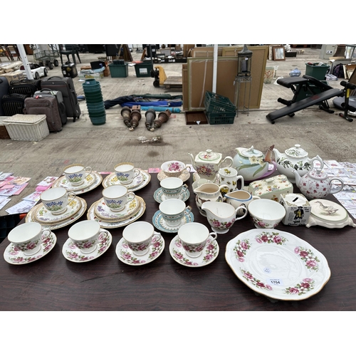 1704 - AN ASSORTMENT OF CERAMICS TO INCLUDE FOUR ROYAL WORCESTER PLACE SETTINGS WITH CUPS, SAUCER, SIDE PLA... 