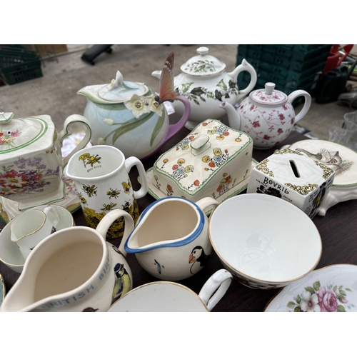 1704 - AN ASSORTMENT OF CERAMICS TO INCLUDE FOUR ROYAL WORCESTER PLACE SETTINGS WITH CUPS, SAUCER, SIDE PLA... 