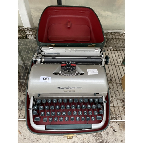 1609 - A REMINGTON QUIET-RITER TYPEWRITER WITH CARRY CASE