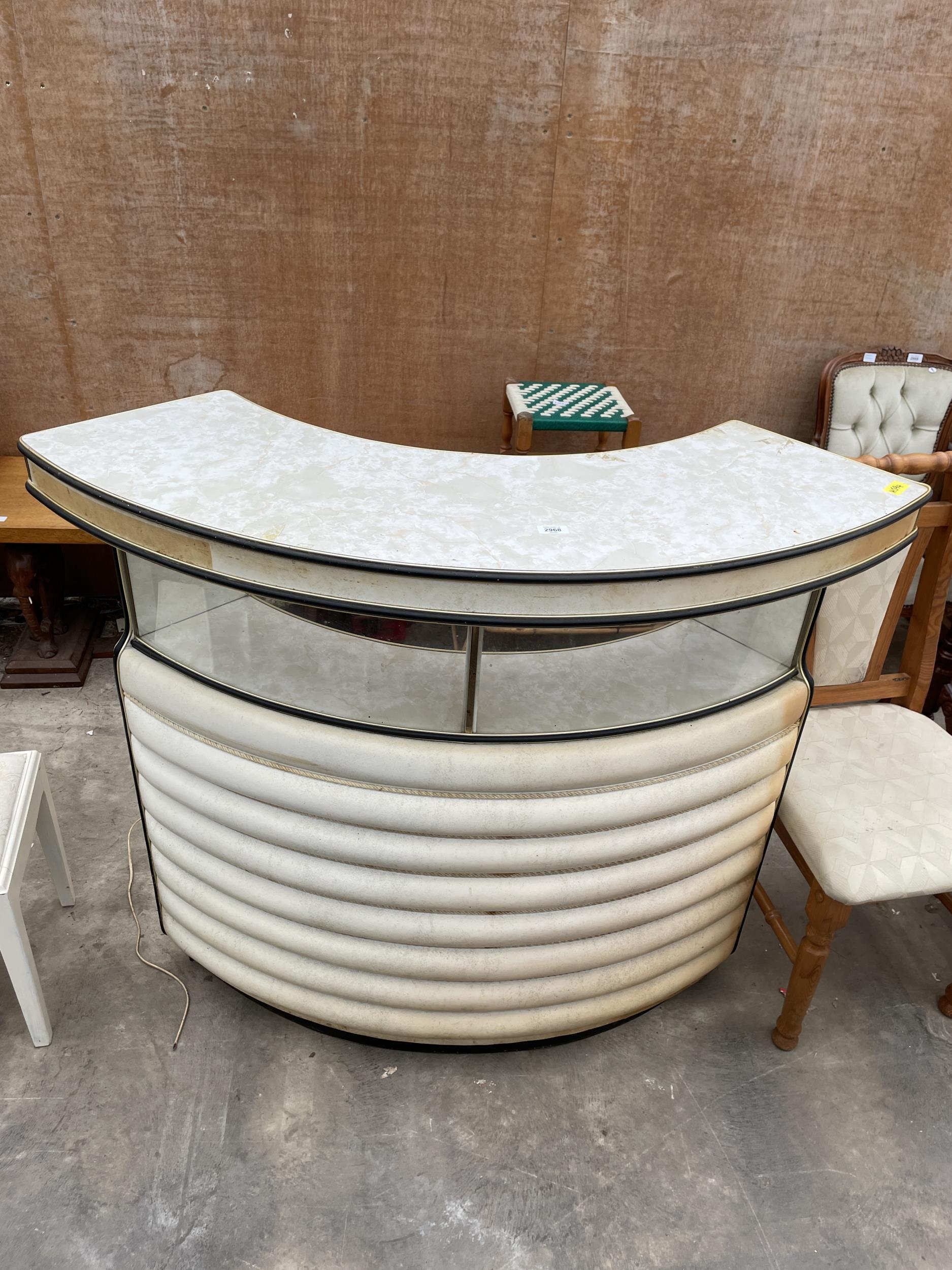 A MID 20TH CENTURY CRESENT SHAPED COCKTAIL COUNTER/BAR