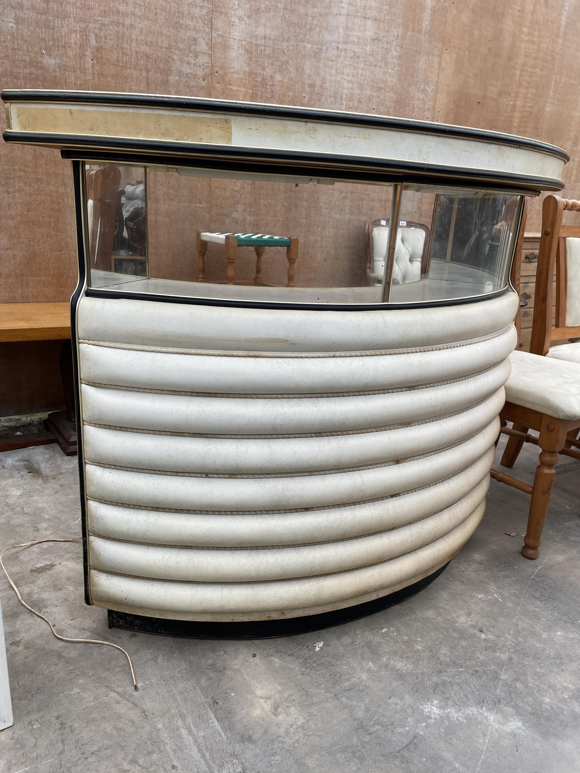 A MID 20TH CENTURY CRESENT SHAPED COCKTAIL COUNTER/BAR