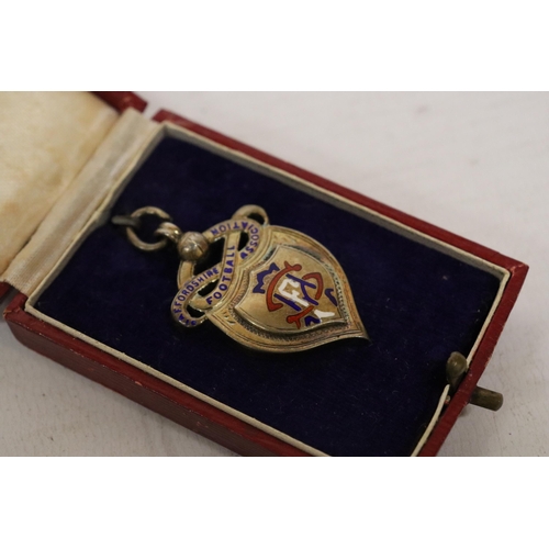 318 - A BIRMINGHAM HALLMARKED SILVER STAFFORDSHIRE FOOTBALL ASSOCIATION SENIOR CUP WINNERS 1952/53 MEDAL W... 