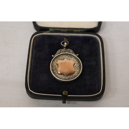 320 - A BIRMINGHAM HALLMARKED SILVER FOOTBALL MEDAL IN ITS ORIGINAL DERBYSHIRE FOOTBALL ASSOCIATION PRESEN... 