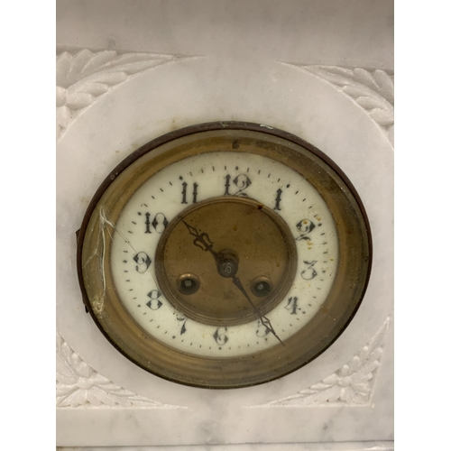 10 - A VERY HEAVY WHITE MARBLE CLOCK WITH KEY AND PENDULUM