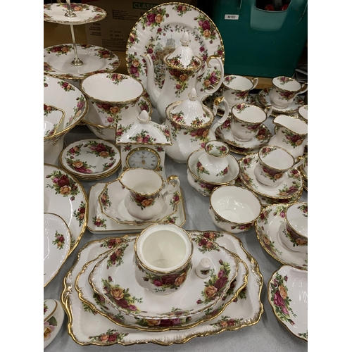 15 - A VERY LARGE COLLECTION OF ROYAL ALBERT OLD COUNTRY ROSES TO INCLUDE TRIOS, JUGS, SUGAR BOWLS, COFFE... 